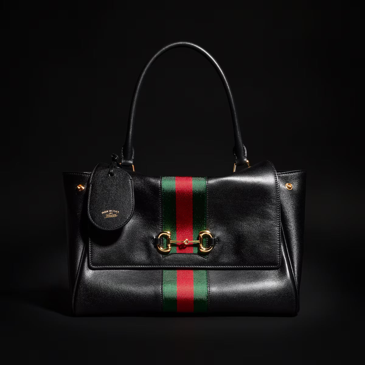 GUCCI Paparazzo medium top handle bag