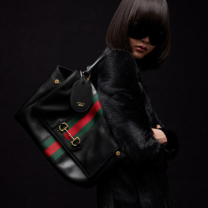 GUCCI Paparazzo medium top handle bag